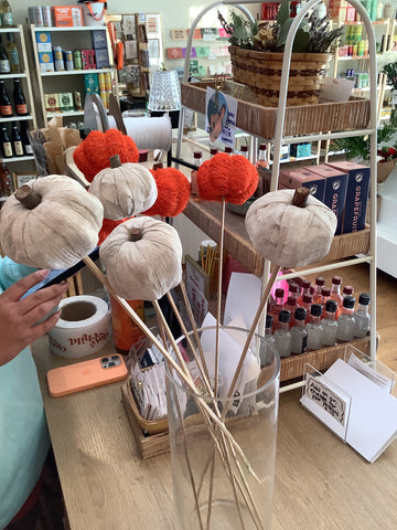 Faux pumpkin on a stick