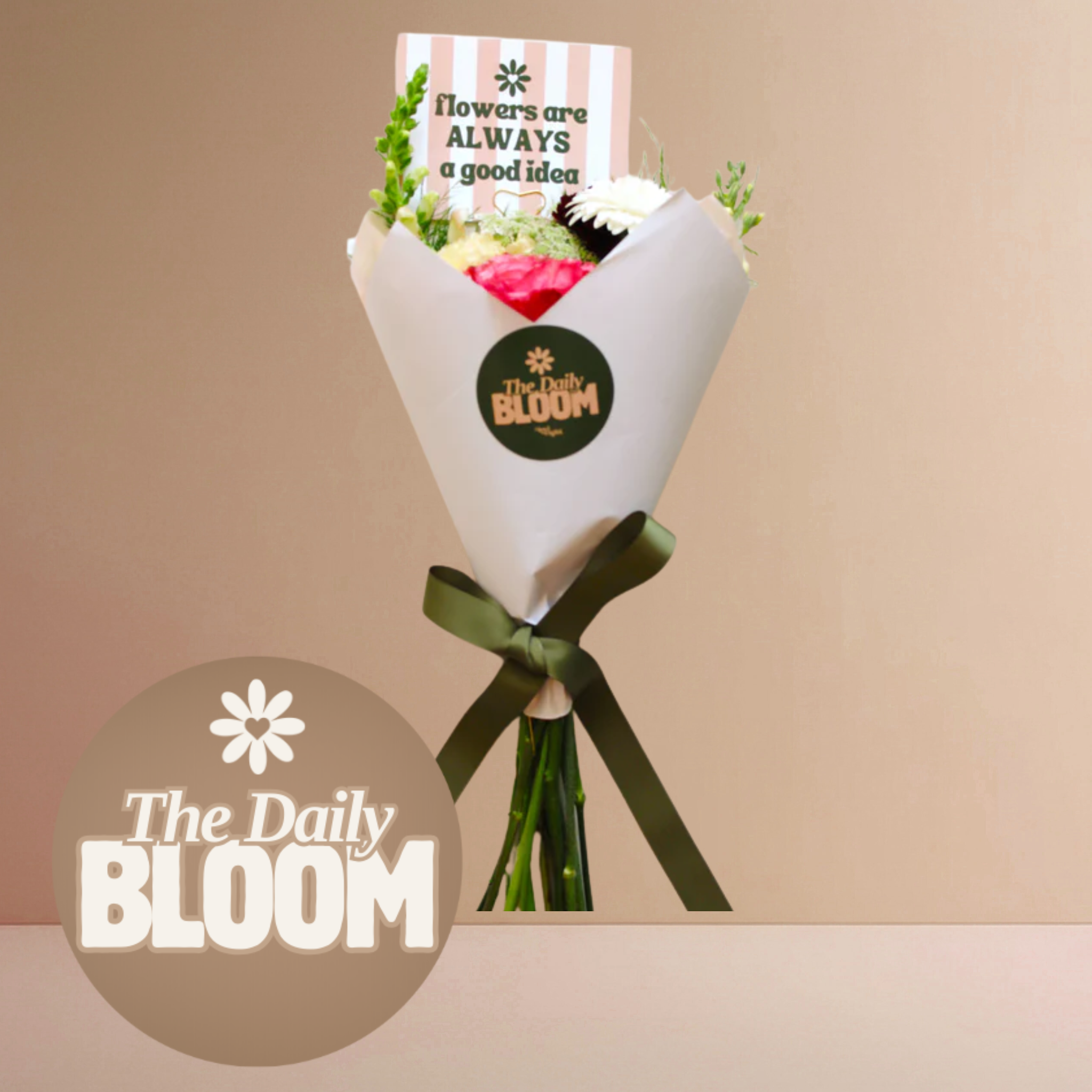 bouquet wrapped with white paper and ribbon