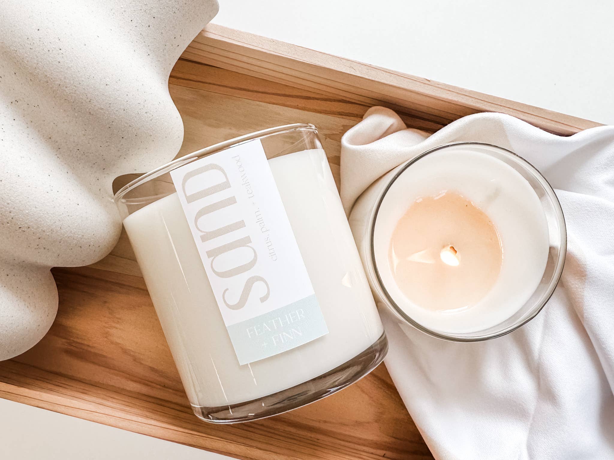 sand | citrus, palm, + teakwood | 12oz